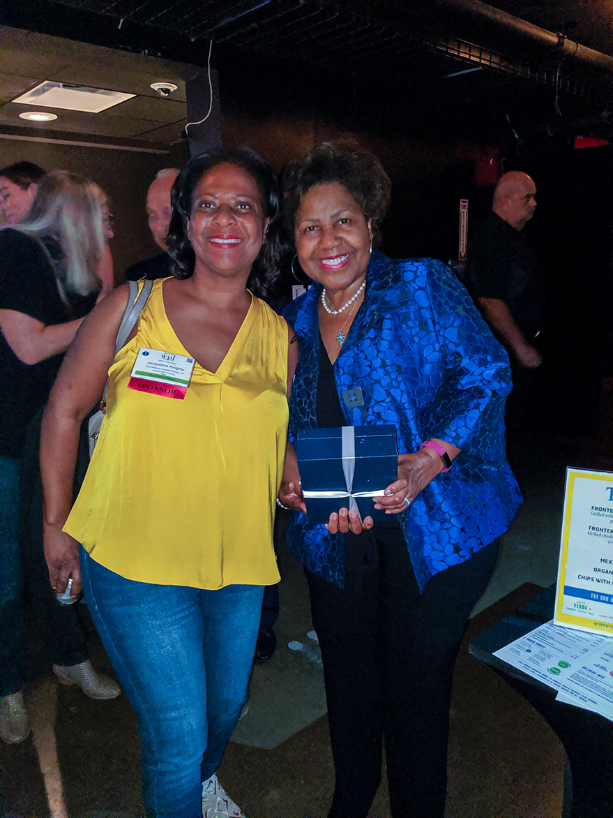 Photo from Comptroller Darlene Green receiving the Women In Public Finance Lifetime Achievement award.