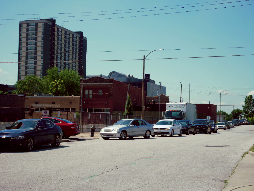 Cars lined up for several blocks as to wait for testing.