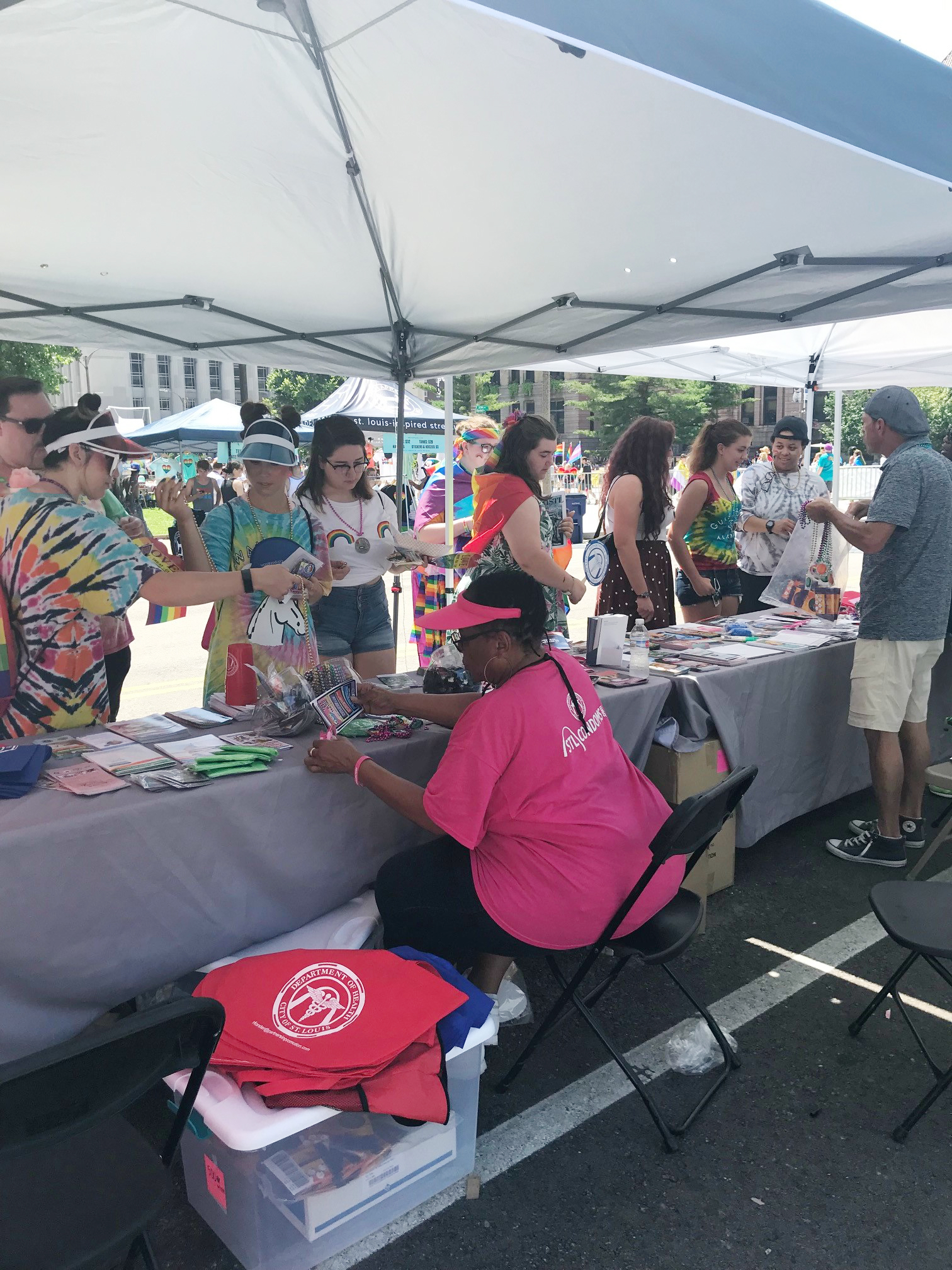 Passing out important information and resources to PrideFest attendees