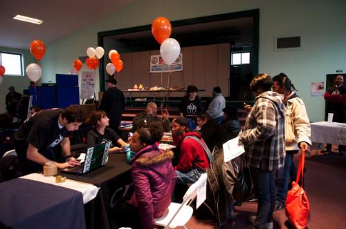Volunteers helping clients.