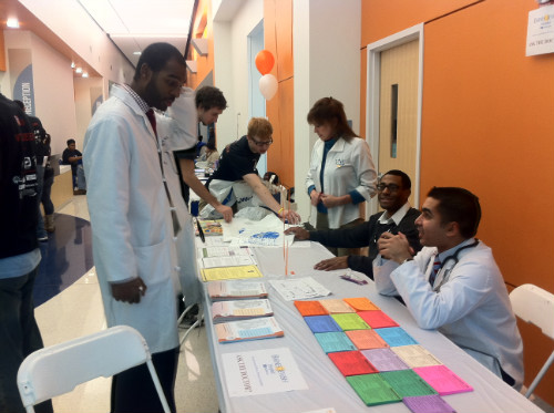 Doctors answering client questions.