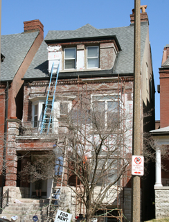 A historic house in the Central West End gets its facade cleaned