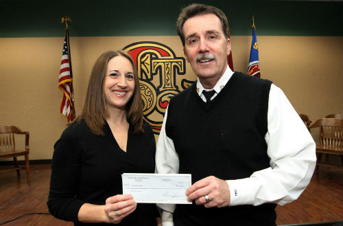 Fire Chief Jenkerson receives donation from Chiodini Family Enterprises d/b/a Zia's on the Hill on Jan. 18, 2012.