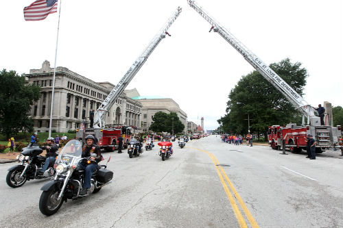 2014 Fire Engine Parade begins with a motorcycle escort