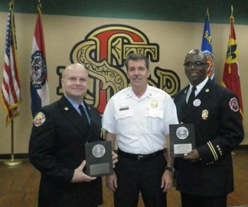 Fire Chief Dennis Jenkerson (c) with Firemark Award recipients Firefighter Shawn Bittle (l) and Fire Captain Larry Conley.