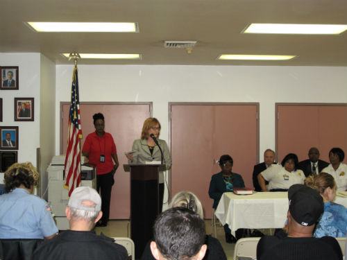 Public Safety Director Charlene Deeken addresses the families.