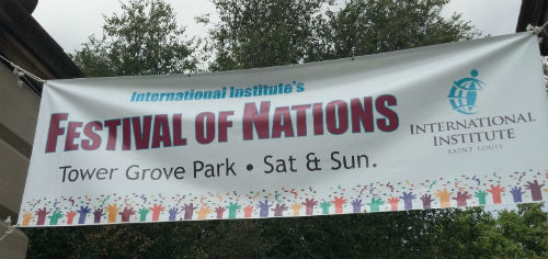 Festival of Nations banner at the Grand and Arsenal entrance to Tower Grove Park.
