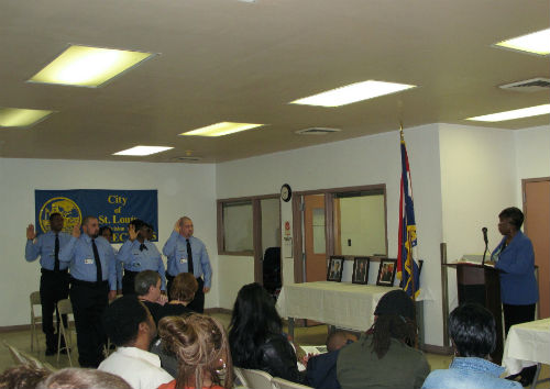 City Register Parrie May administers the Oath to the class.