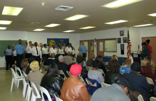 City Register Parrie May administers the oath to the class