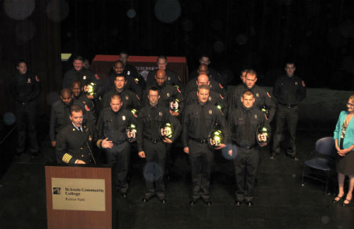 St. Louis Fire Chief Dennis Jenkerson presents the class