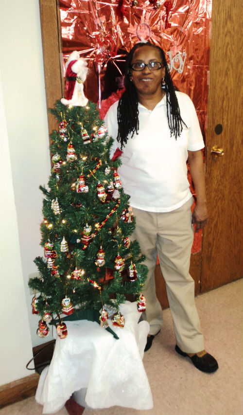 COR staff poses by the Special Services entry in the 2012 Tree Decorating Contest.