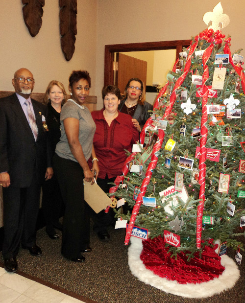 Spirit of St Louis Tree - 2nd Place in 2011 Collector of Revenue Christmas Tree Decorating Contest. Pictured are contest judges Jan Williams, Freddie Dunlap and Sherry Wibbenmeyer and tree decorators Donna Small, Sheryl Fiala and Thelma Showers.