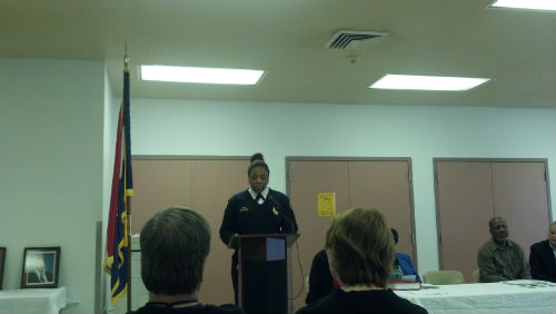 Major Tonya Harry gives brief remarks
