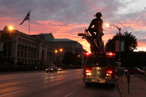 Preparing to raise an American flag at the Firefighters Candlelight Vigil on Sept. 8, 2011.