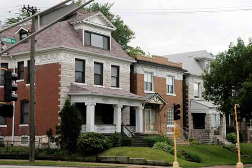 Stone fronted four square homes in Academy