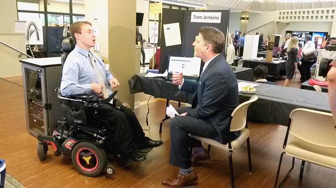 Mike Bush interviews Job Fair participant