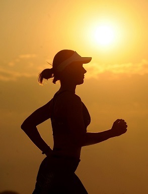 running in hot sun image