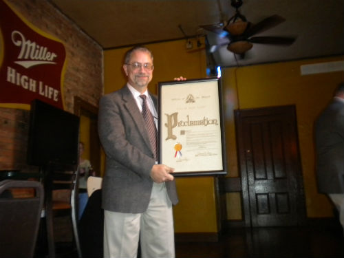Roger Alison with his proclamation from Mayor Francis G. Slay